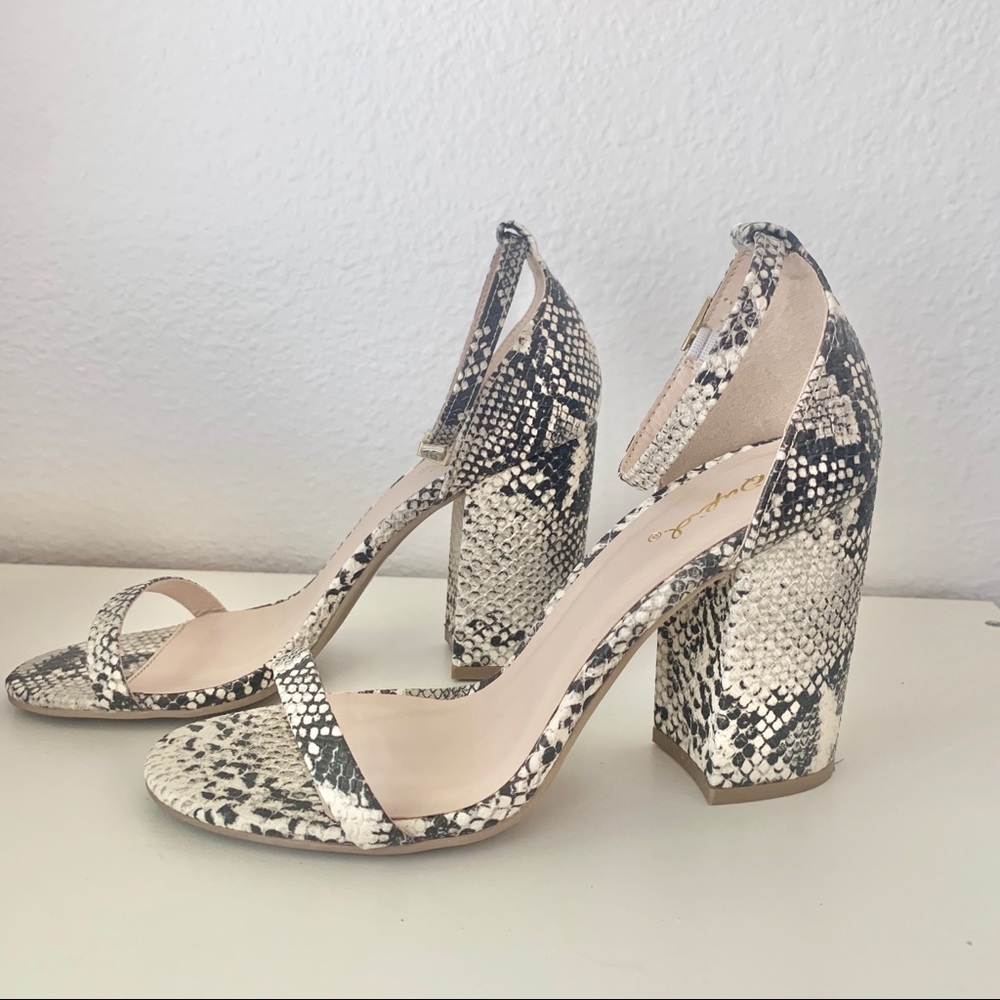 Autry Stone and Black Snake Ankle Strap Heels